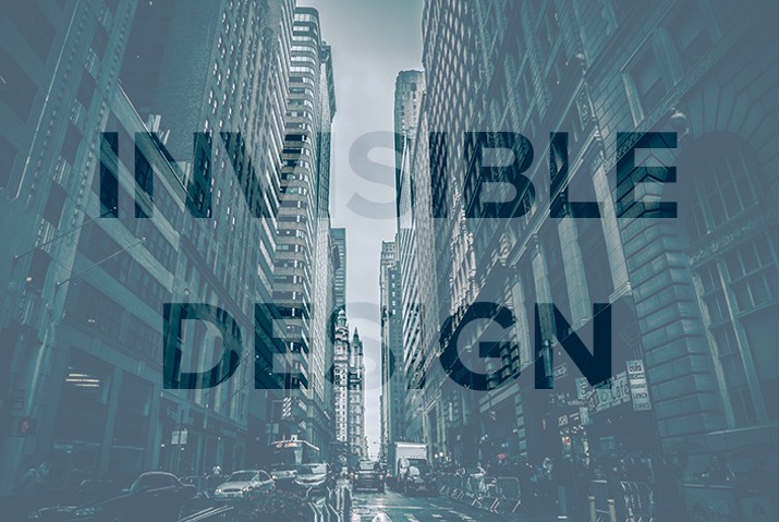 the words invisible design reversed out over a scene of a busy city street