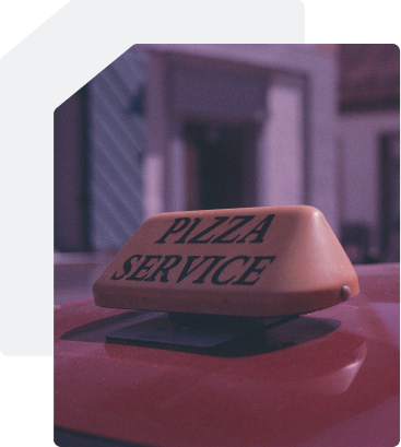 Car sign that reads 'pizza service'